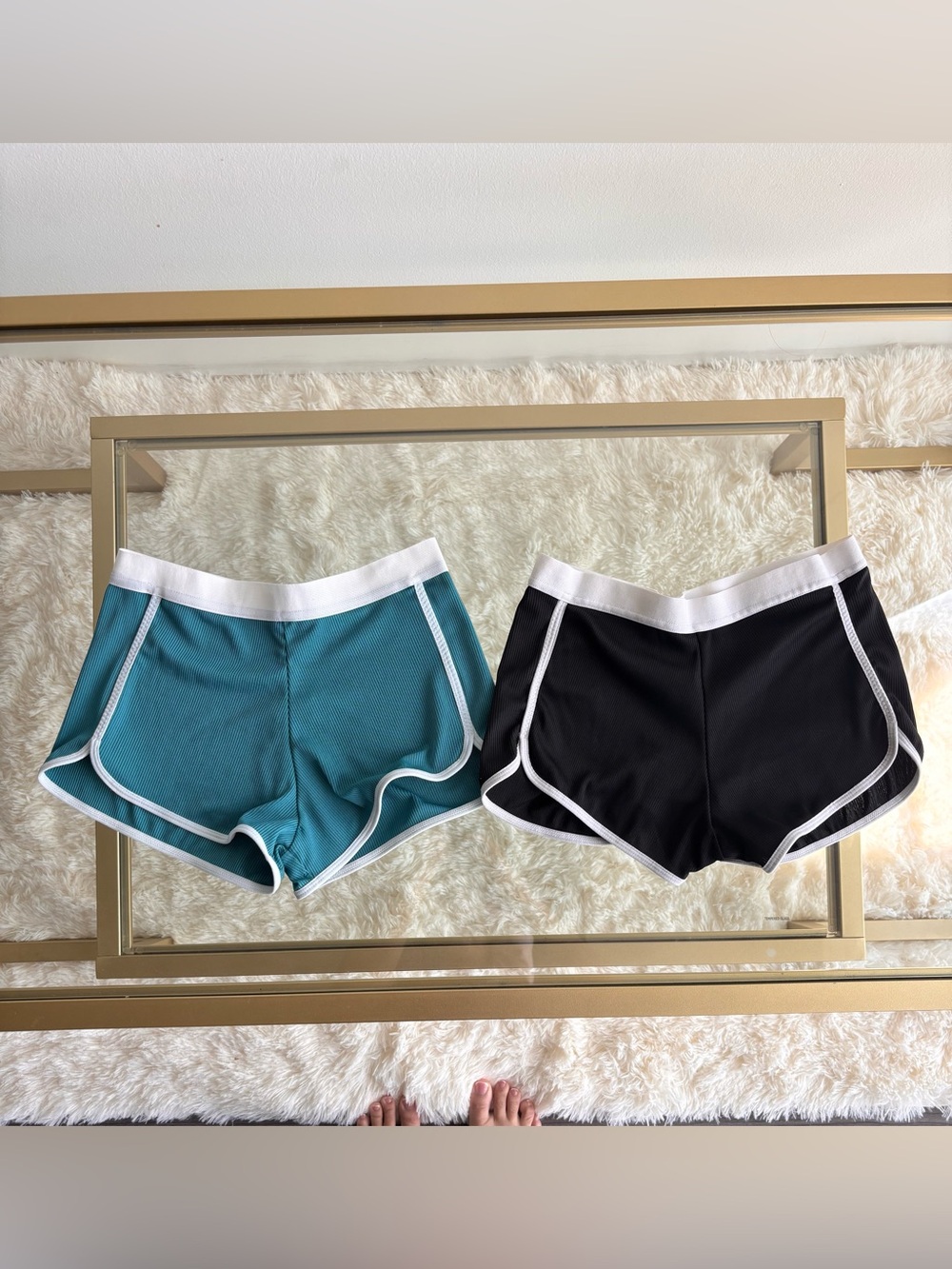Pair of Women’s Athletic Dolphin Shorts - Teal & Black size small